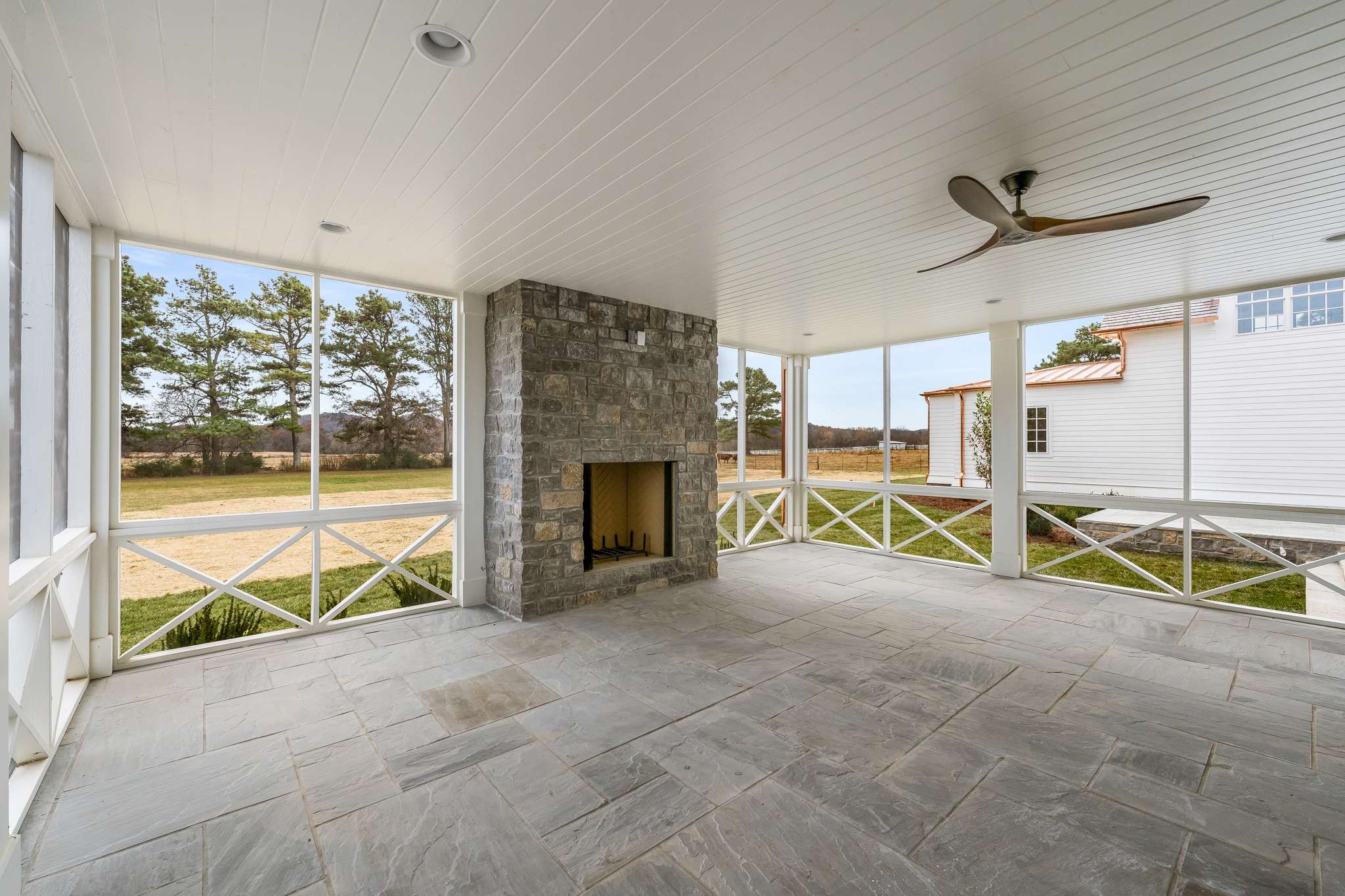 1995 Old Hillsboro Road Franklin, TN 37064 - Photo 53 of 70 an empty room with floor to ceiling window and an outdoor view