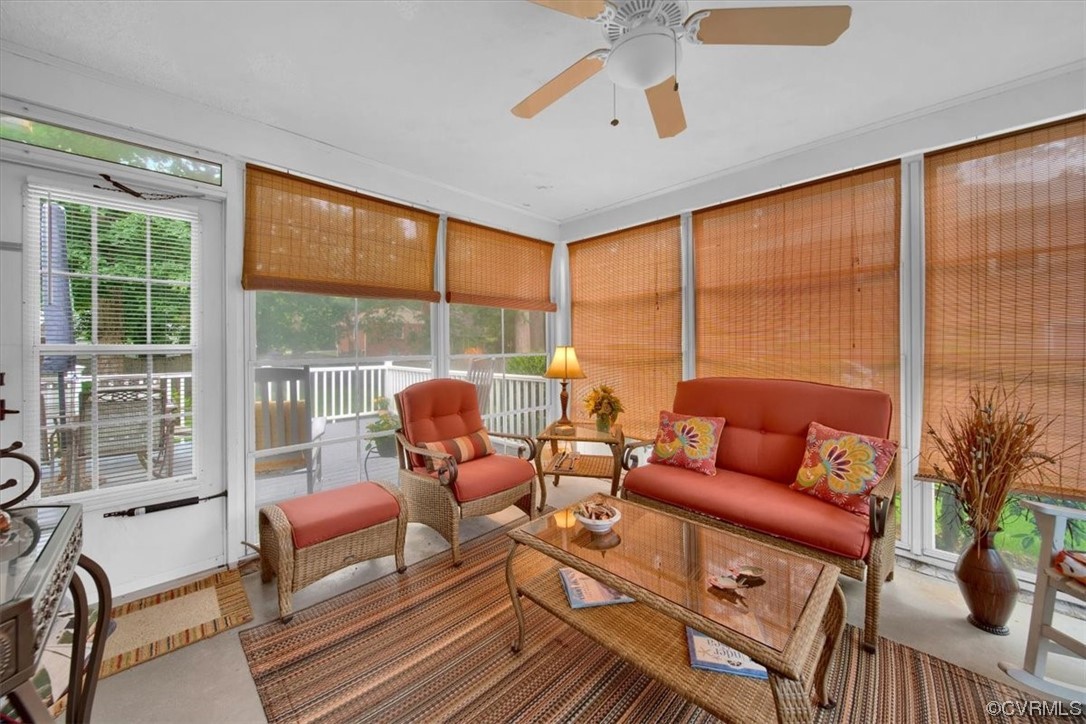 900 Ryder Road Richmond, VA 23235 - Photo 14 of 47 a living room with furniture and a floor to ceiling window