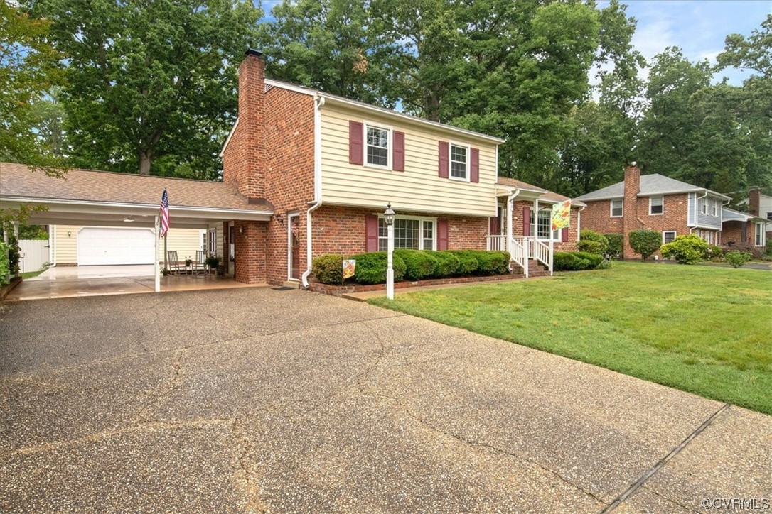 900 Ryder Road Richmond, VA 23235 - Photo 2 of 47 front view of a house with a yard