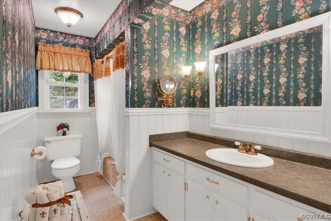 900 Ryder Road Richmond, VA 23235 - Photo 23 of 47 a bathroom with a granite countertop sink and a mirror