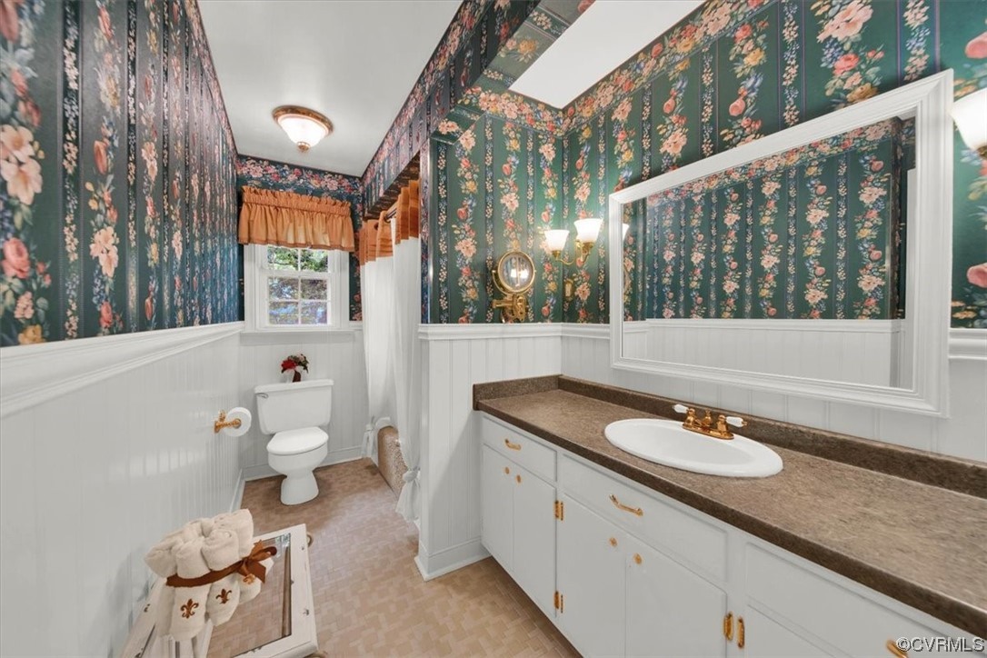 900 Ryder Road Richmond, VA 23235 - Photo 24 of 47 a bathroom with a sink toilet and mirror