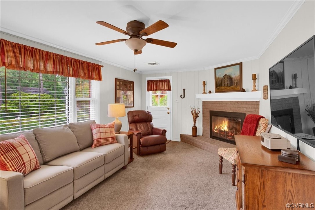 900 Ryder Road Richmond, VA 23235 - Photo 30 of 47 a living room with furniture and a fireplace