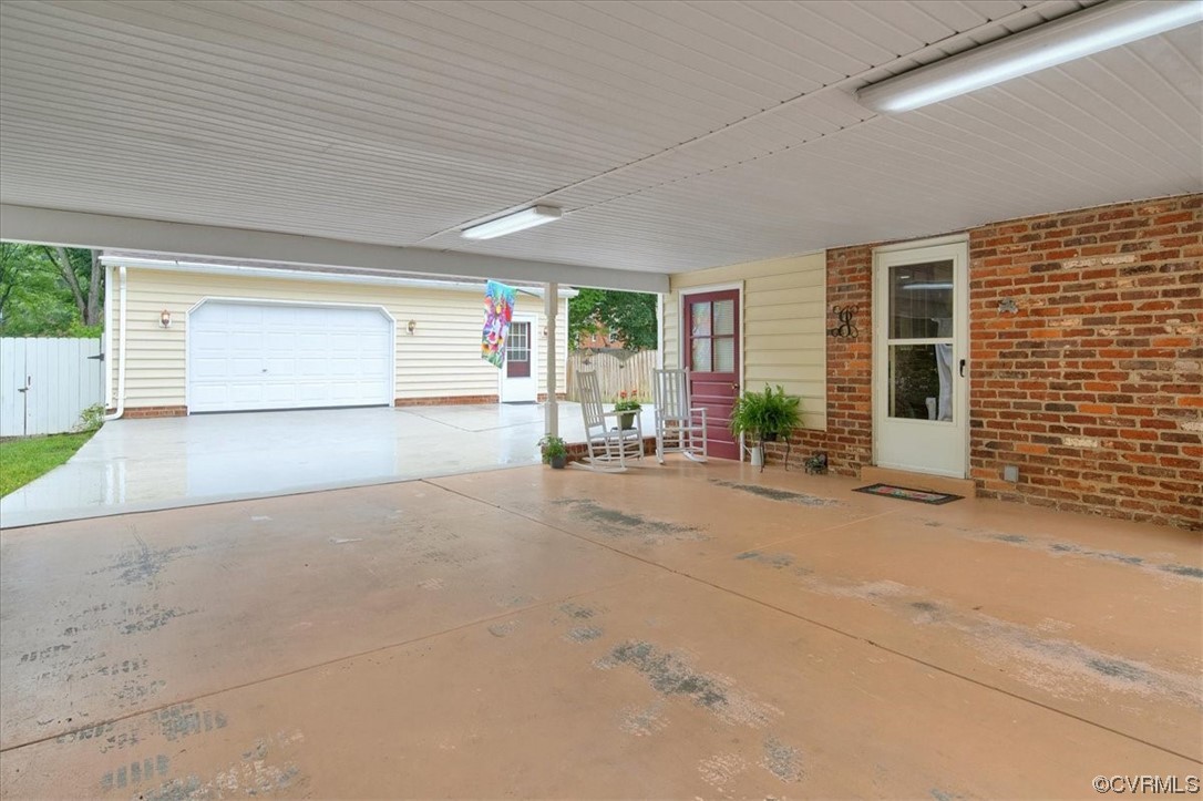 900 Ryder Road Richmond, VA 23235 - Photo 41 of 47 a view of a livingroom with furniture and a garage