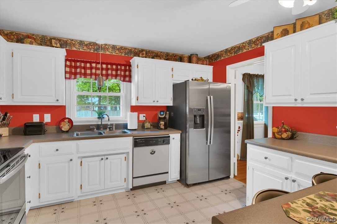 900 Ryder Road Richmond, VA 23235 - Photo 7 of 47 a kitchen with stainless steel appliances granite countertop a refrigerator sink and cabinets