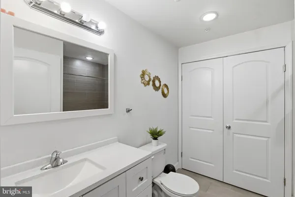 a bathroom with a shower and a shower