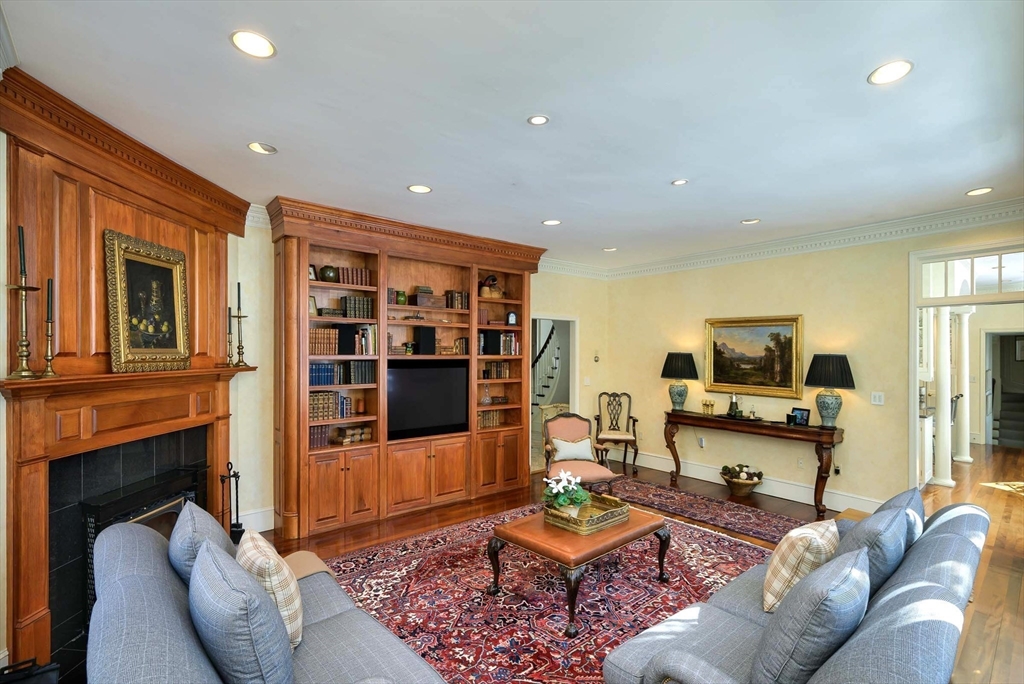 32 Sears Road Southborough, MA 01772 - Photo 17 of 41 a living room with furniture and a flat screen tv