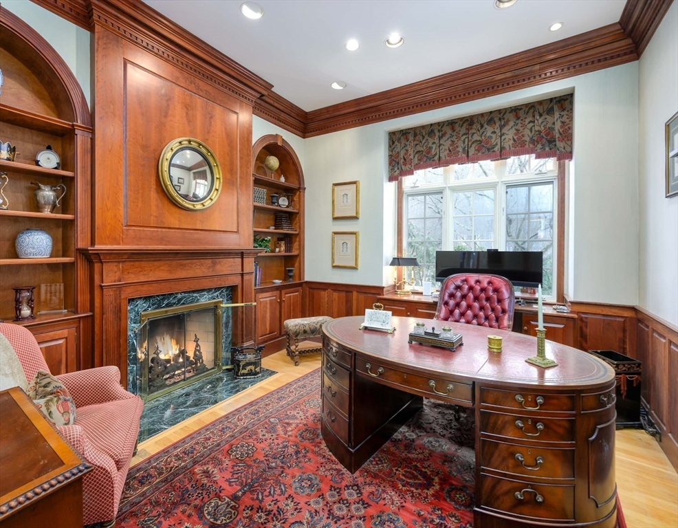 32 Sears Road Southborough, MA 01772 - Photo 19 of 41 a living room with furniture and a fireplace
