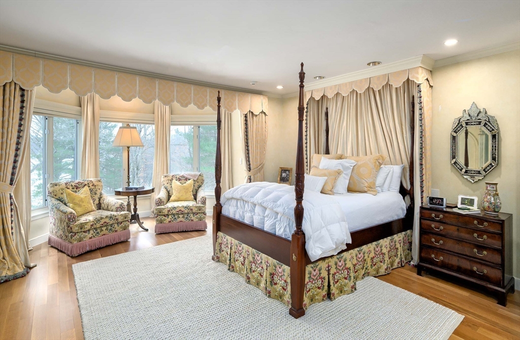 32 Sears Road Southborough, MA 01772 - Photo 22 of 41 a spacious bedroom with a bed a couch and a large window