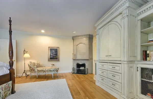 a spacious bathroom with double vanity and a mirror
