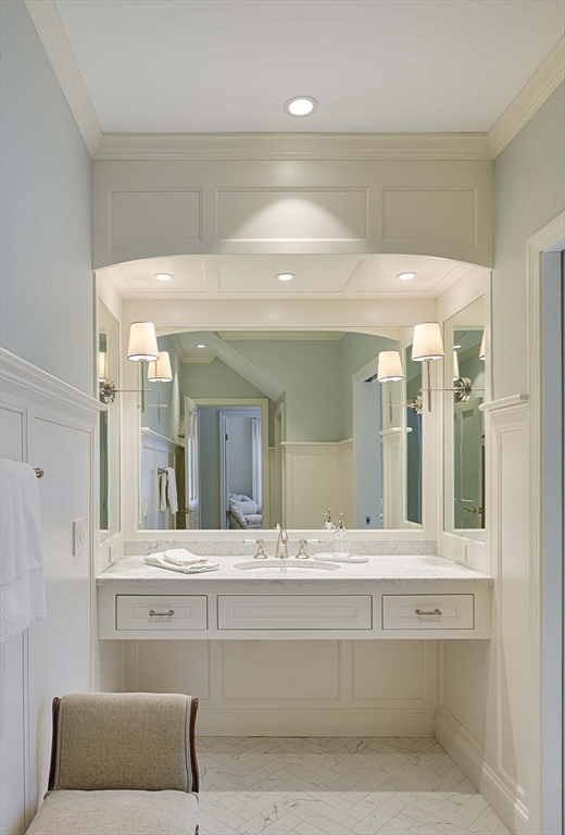 32 Sears Road Southborough, MA 01772 - Photo 29 of 41 a bathroom with a sink and a large mirror