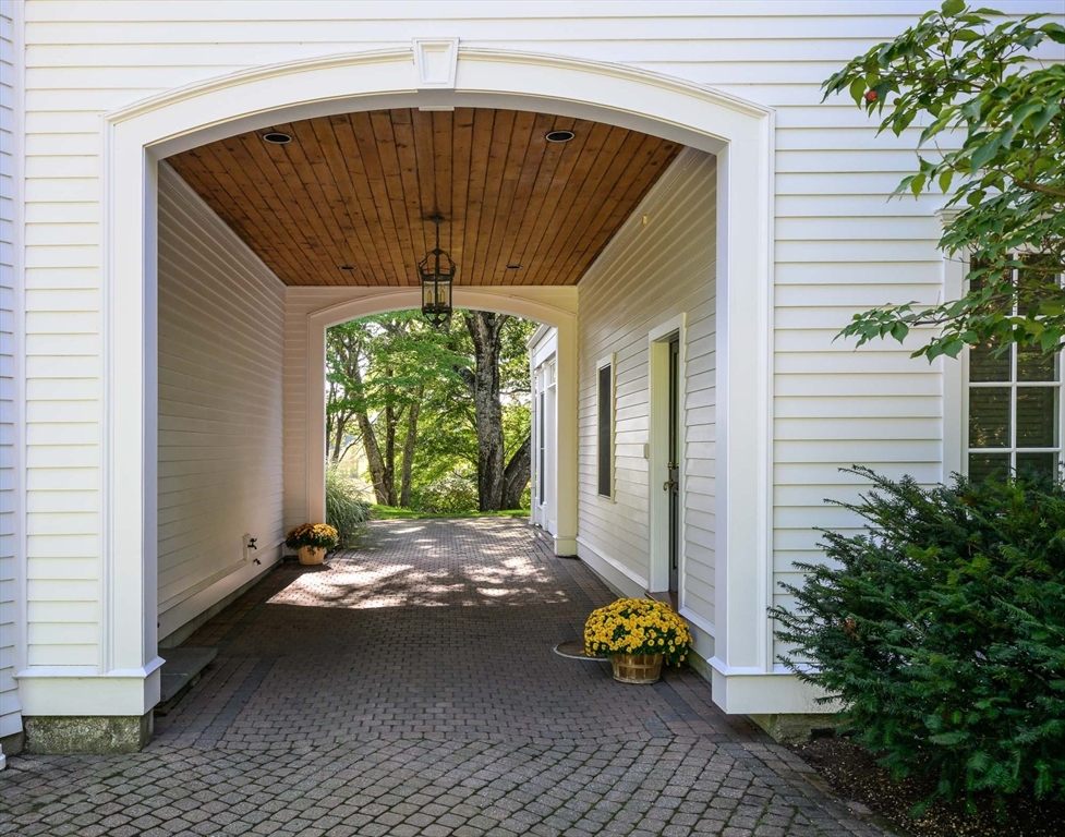 32 Sears Road Southborough, MA 01772 - Photo 3 of 41 a front view of a house with a yard