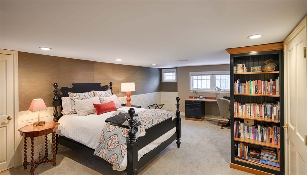 32 Sears Road Southborough, MA 01772 - Photo 33 of 41 a bed room with a bed and a book shelf