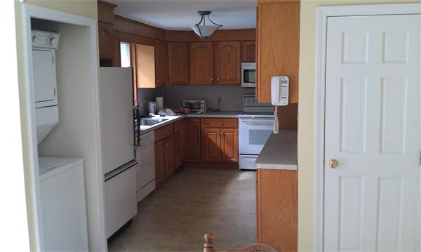 37 Dale Road Holbrook, MA 02343 - Photo 15 of 15 a kitchen with cabinets and a window