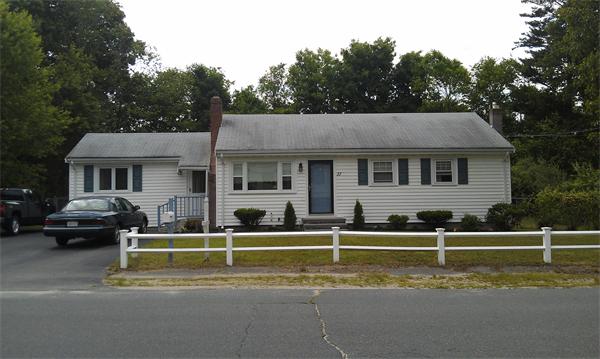 37 Dale Road Holbrook, MA 02343 - Photo 2 of 15 a view of a white house in a big yard with large trees