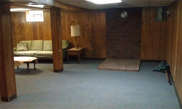 37 Dale Road Holbrook, MA 02343 - Photo 6 of 15 a view of a livingroom with furniture and a gate