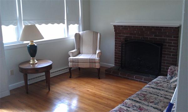37 Dale Road Holbrook, MA 02343 - Photo 10 of 15 a living room with furniture and a fireplace