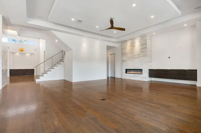 a kitchen with stainless steel appliances granite countertop a sink and stove