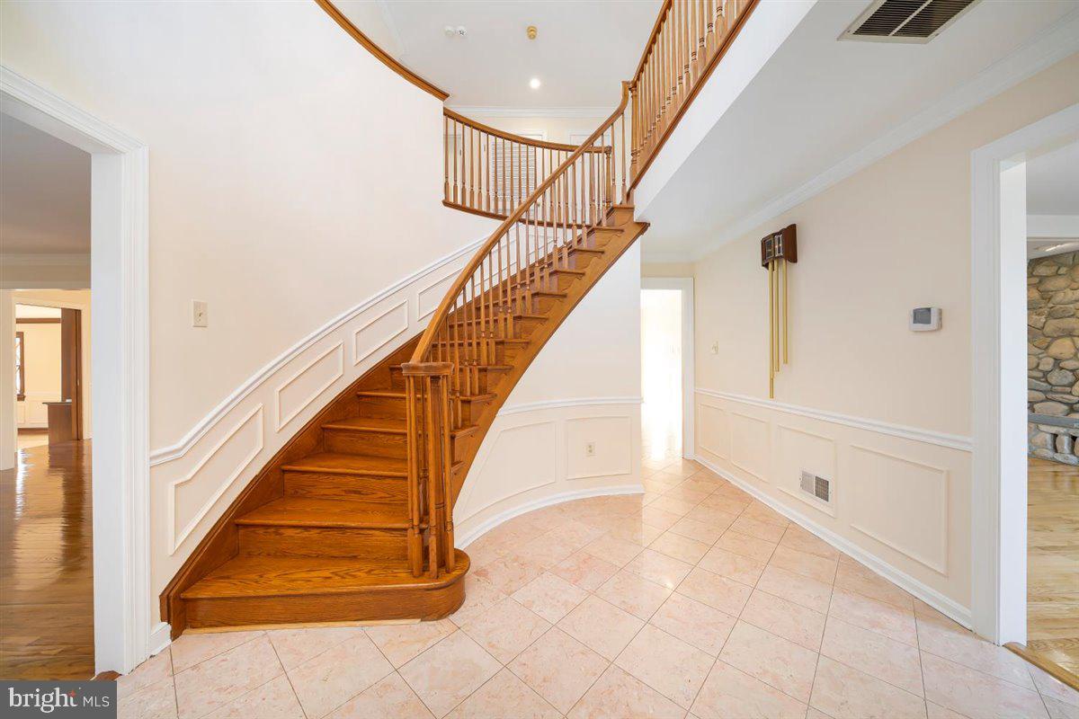 104 Farmgate Lane Silver Spring, MD 20905 - Photo 4 of 78 Foyer With Curved Stairs
