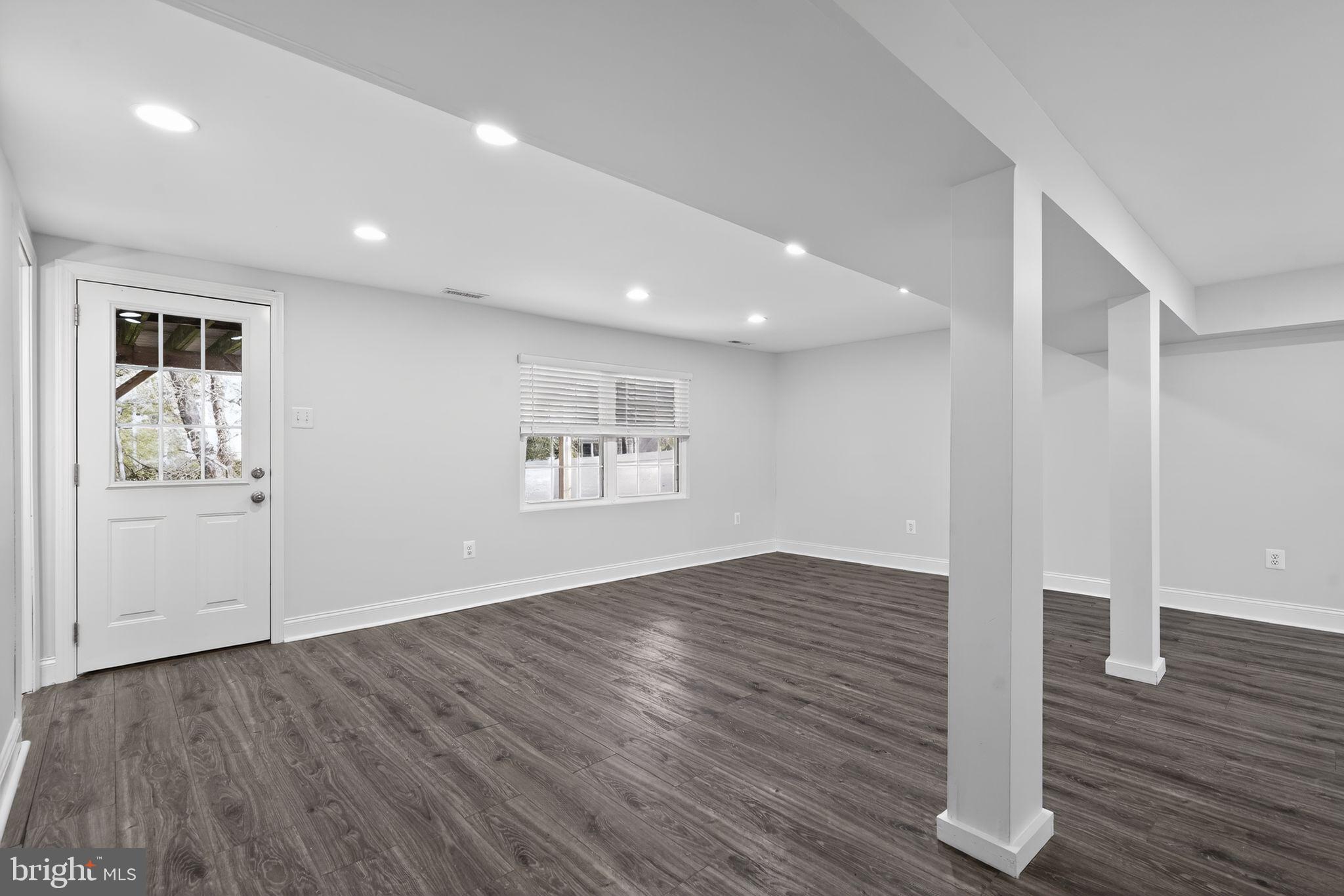 73 Greenvale Road Cherry Hill, NJ 08034 - Photo 15 of 23 an empty room with wooden floor and window