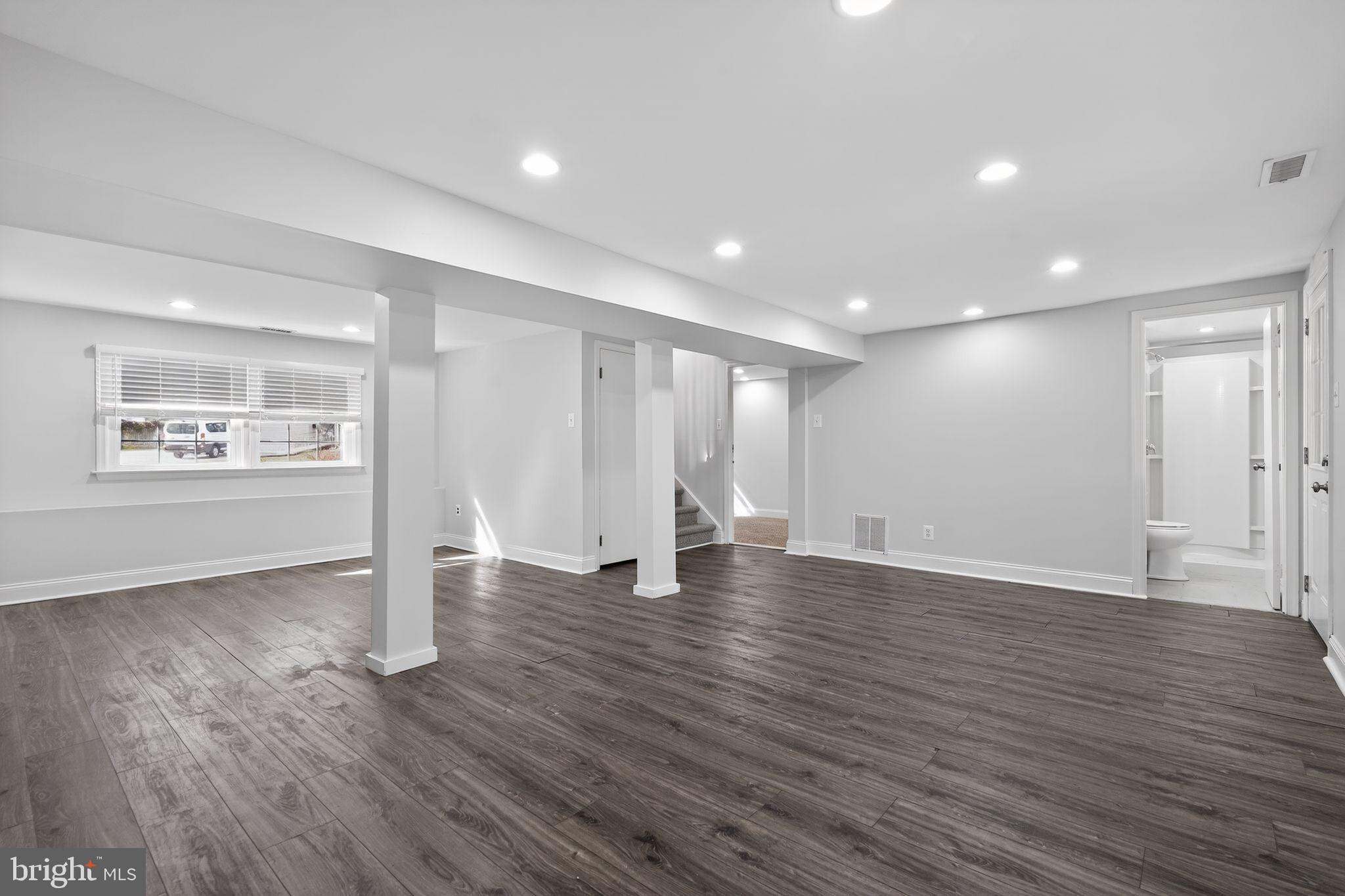 73 Greenvale Road Cherry Hill, NJ 08034 - Photo 16 of 23 a view of an empty room with wooden floor and a window
