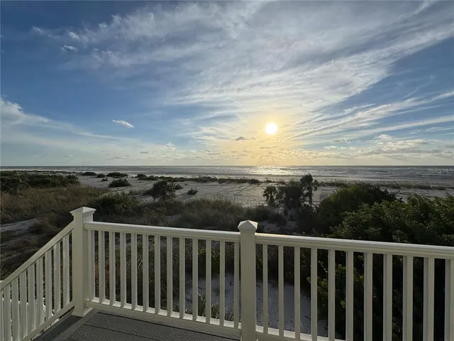 a balcony with an outdoor space