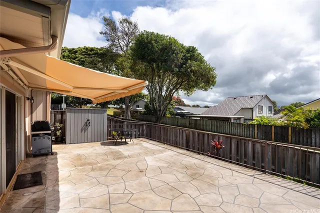 a view of a terrace with sitting area