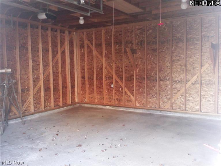 3642 Bainbridge Road Cleveland Heights, OH 44118 - Photo 19 of 25 Newly built garage with flawless garage floor! (just leaves in photo)