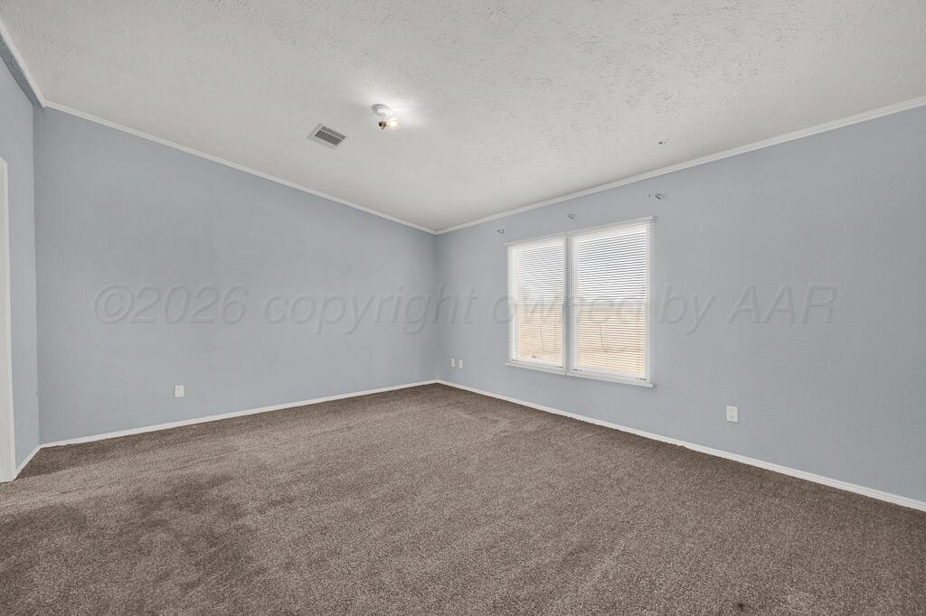 17650 Krabbe Street Canyon, TX 79015 - Photo 11 of 29 a view of an empty room with a window