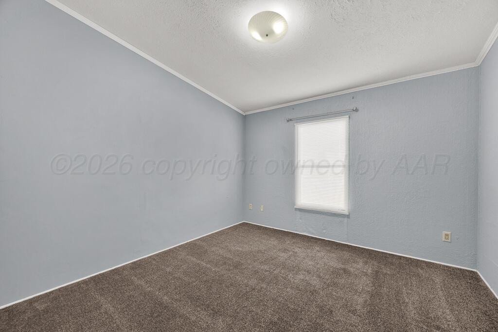 17650 Krabbe Street Canyon, TX 79015 - Photo 17 of 29 an empty room with a window