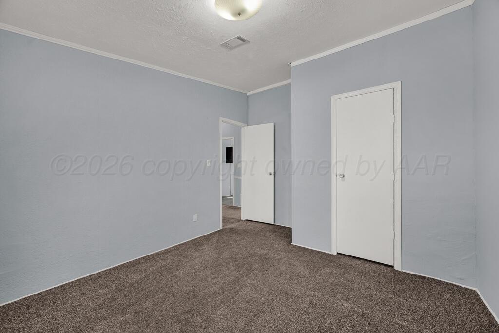 17650 Krabbe Street Canyon, TX 79015 - Photo 18 of 29 a view of an empty room and closet area