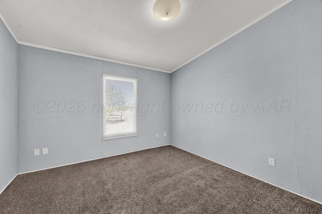 17650 Krabbe Street Canyon, TX 79015 - Photo 19 of 29 a view of an empty room with a window