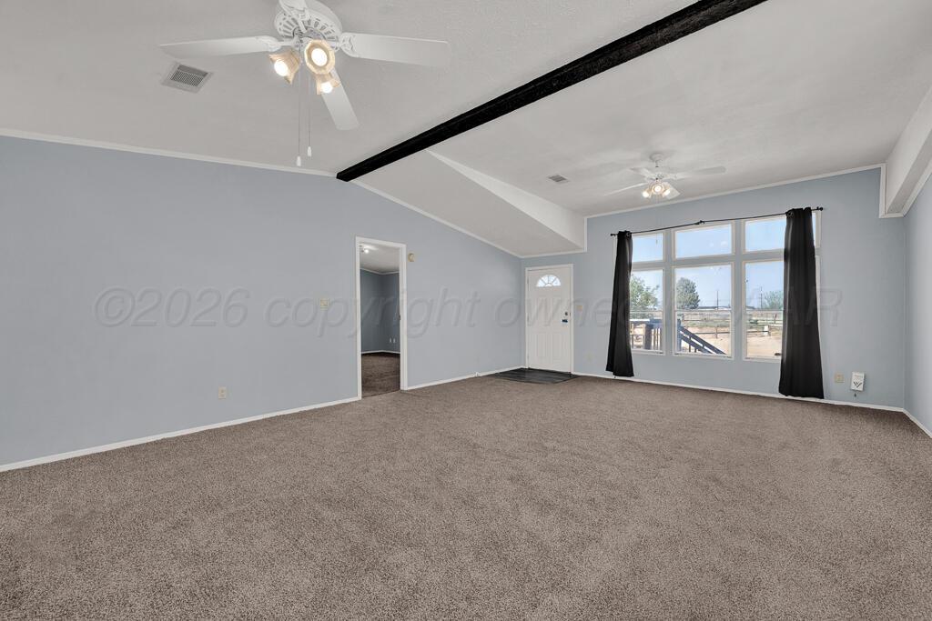 17650 Krabbe Street Canyon, TX 79015 - Photo 5 of 29 a view of an empty room with a window