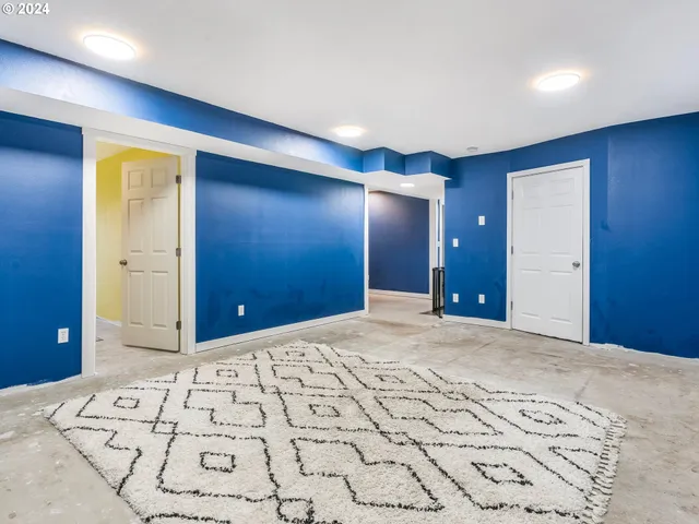 a view of a big room with wooden floor