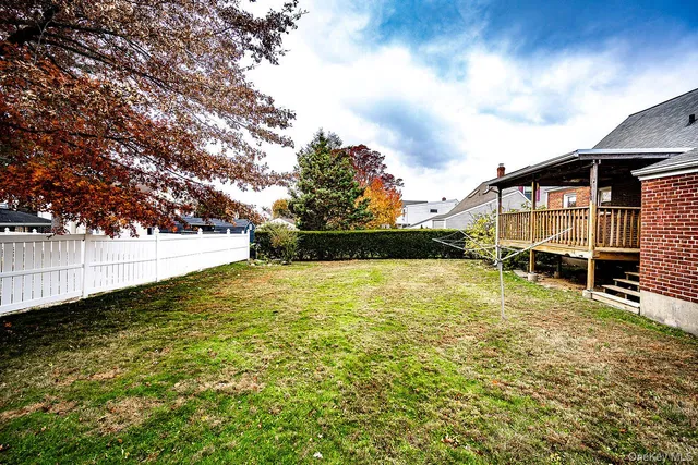 a view of swimming pool with an outdoor seating