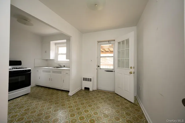 a view of a kitchen with a sink