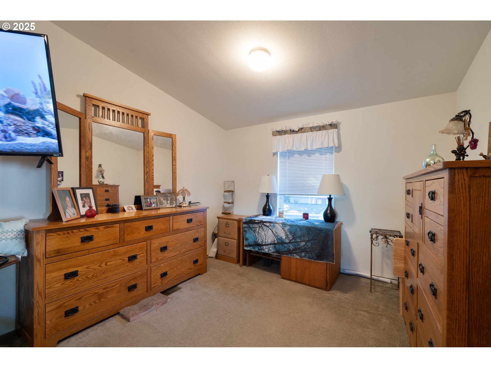 4850 Netarts Highway, Unit 6 Tillamook, OR 97141 - Photo 14 of 14 a living room with furniture and a large window