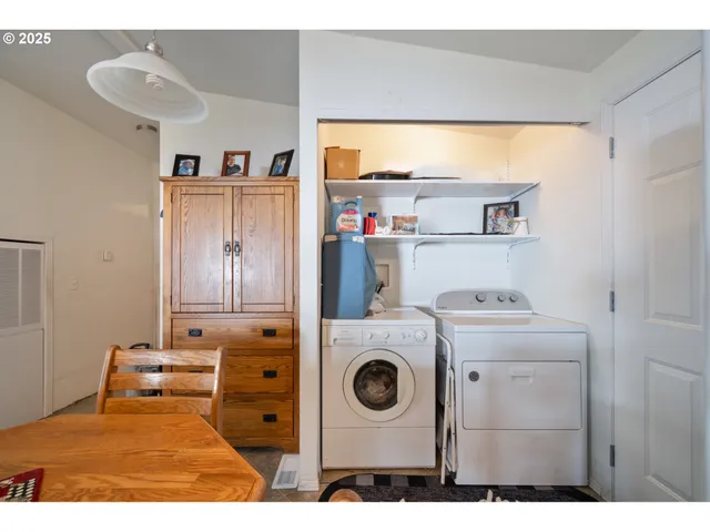 a utility room with dryer and washer