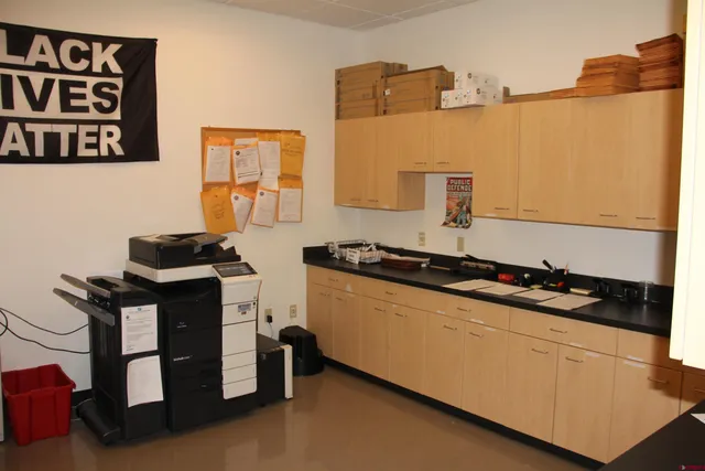 a kitchen with stainless steel appliances granite countertop a stove and a refrigerator
