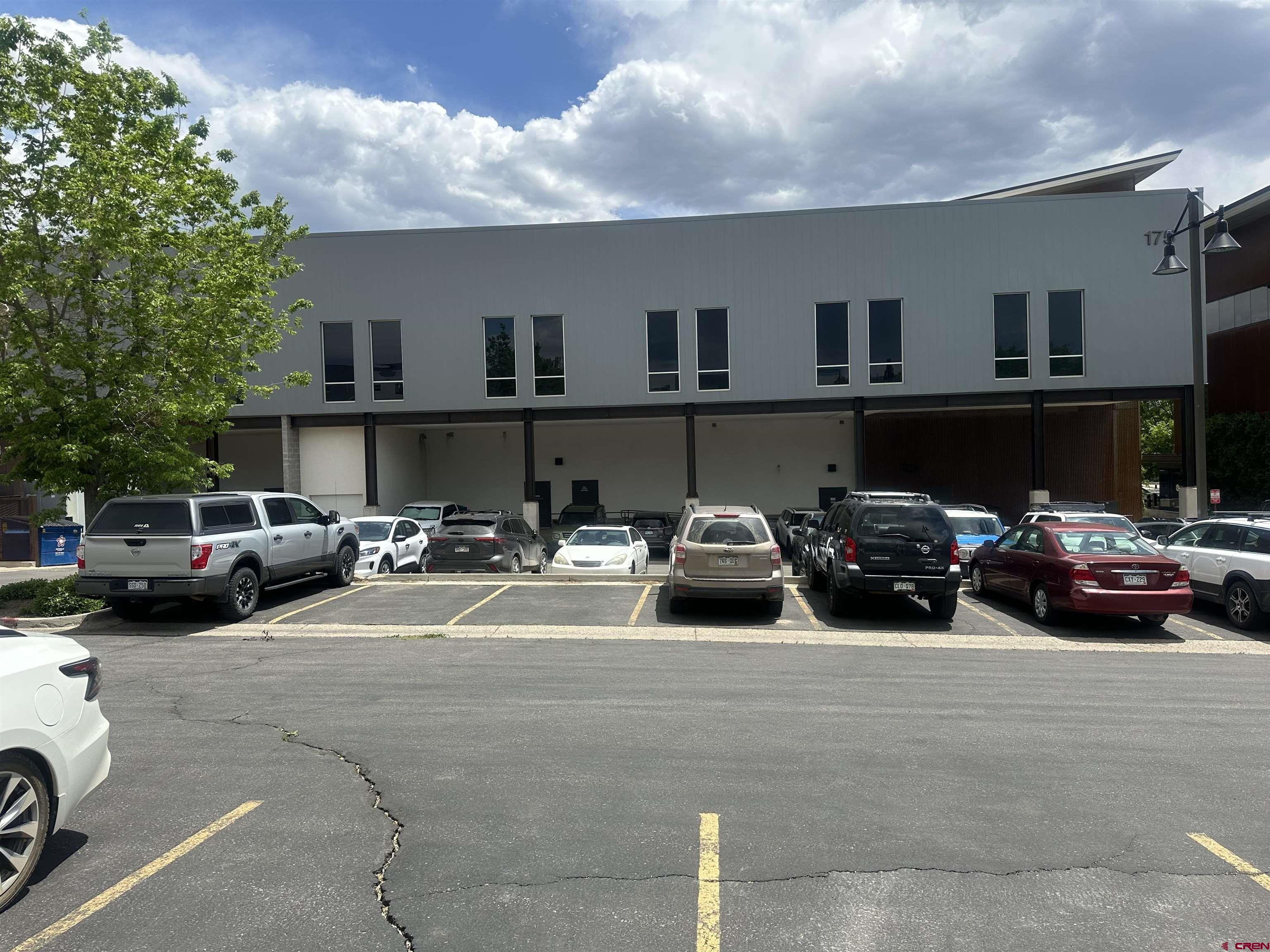 175 Mercado Street, Unit 250 Durango, CO 81301 - Photo 17 of 18 a view of a cars park in front of house