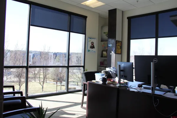 a living room with large window