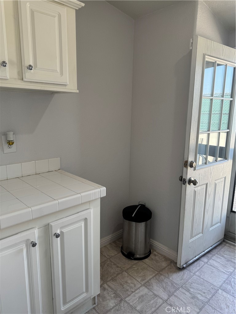 16 Magnolia Anaheim, CA 92801 - Photo 13 of 25 a view of a storage room with wooden floor