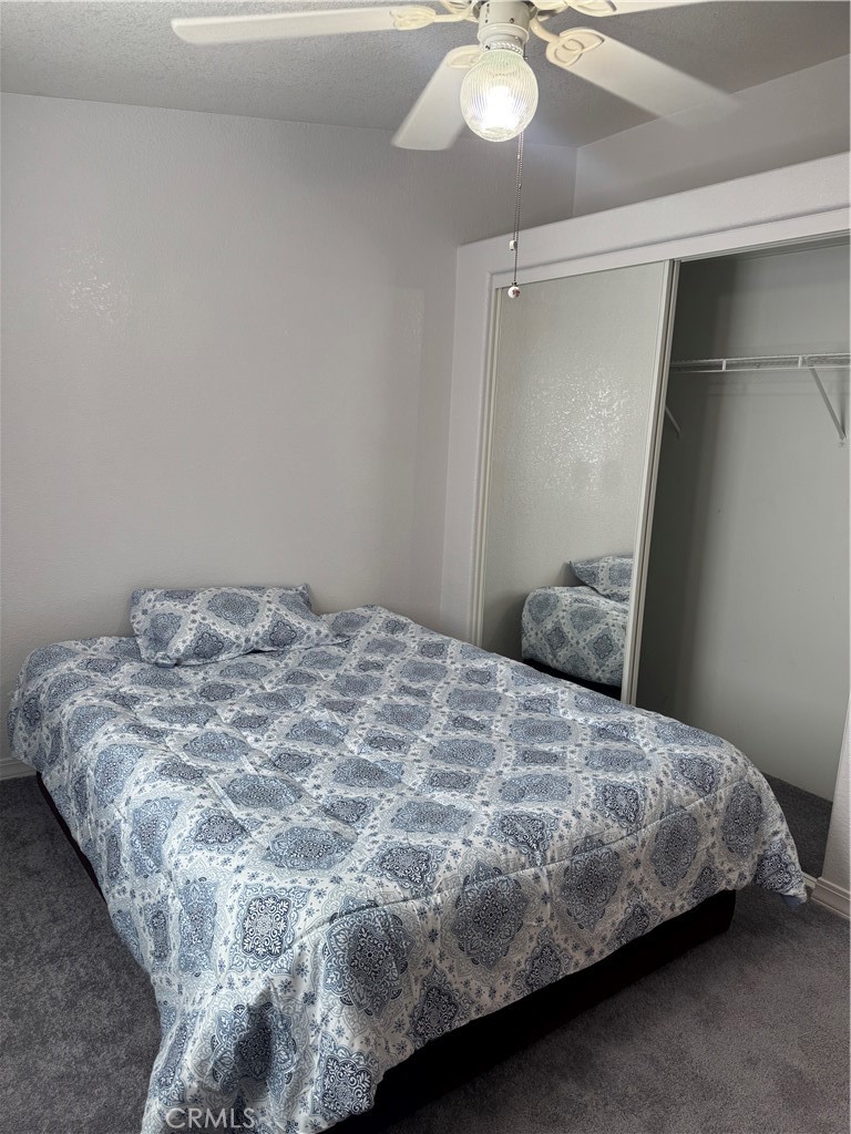 16 Magnolia Anaheim, CA 92801 - Photo 16 of 25 a bedroom with a bed and chandelier