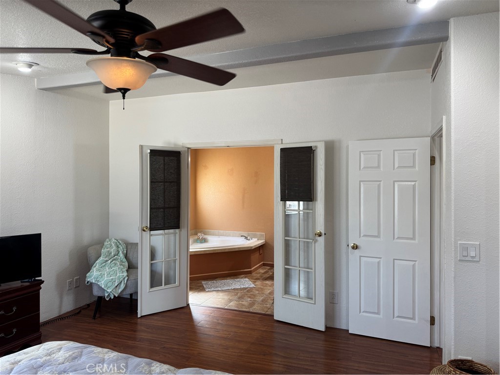 16 Magnolia Anaheim, CA 92801 - Photo 21 of 25 a living room with furniture and a chandelier