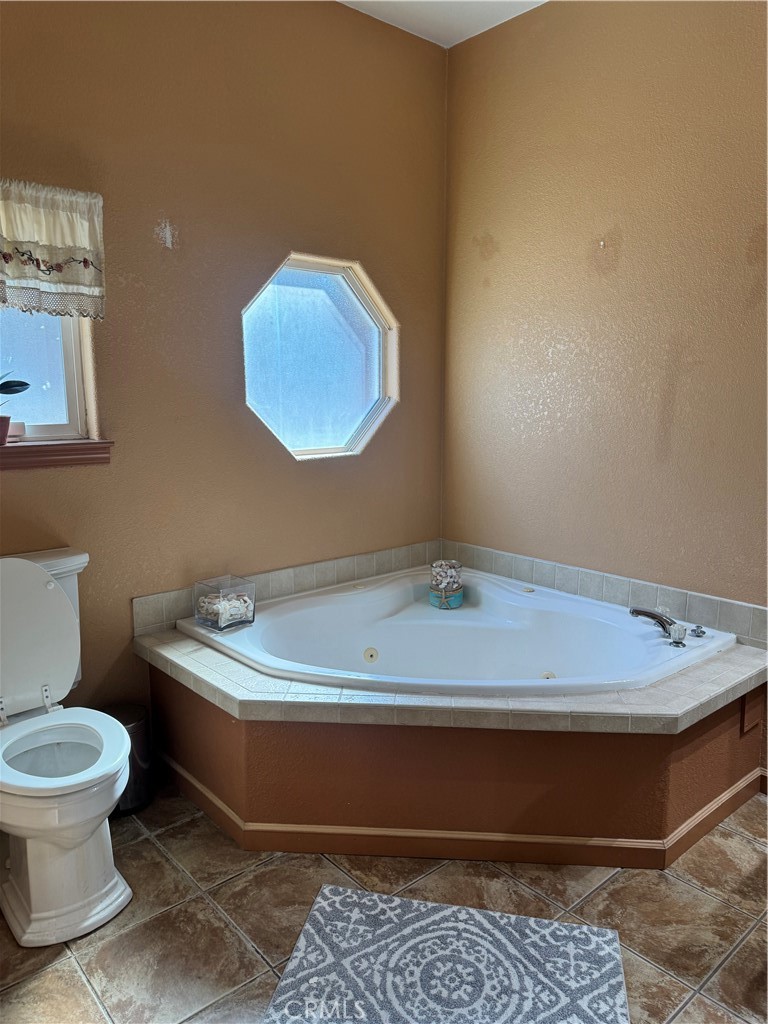 16 Magnolia Anaheim, CA 92801 - Photo 22 of 25 a room with a table and chairs