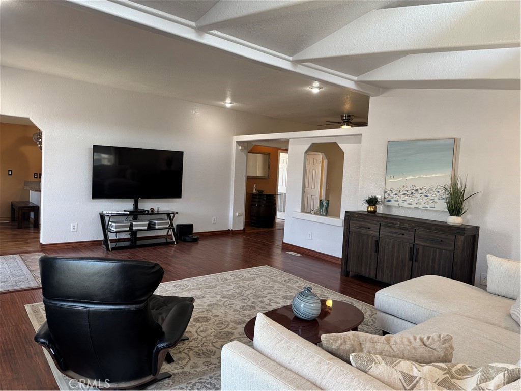 16 Magnolia Anaheim, CA 92801 - Photo 4 of 25 a living room with furniture and a flat screen tv