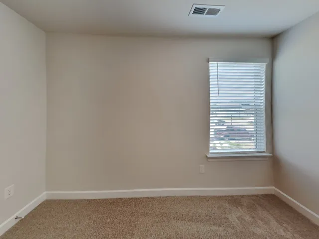 a bathroom with a granite countertop toilet a sink and a bathtub