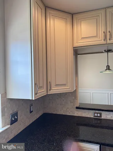 a view of cabinets and window