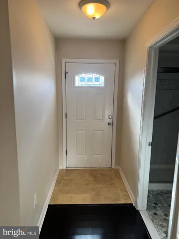 a bathroom with a sink a vanity and a mirror