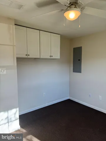 a bathroom with a toilet a sink and a shower