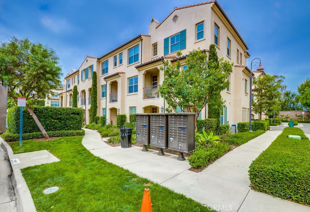 a front view of a building with garden